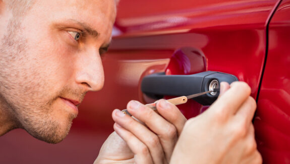 An image of a locksmith unlocking a car door
