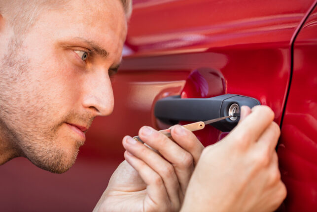 An image of a locksmith unlocking a car door